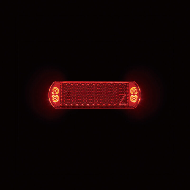 taillight with Z-reflector, brake warning, 50mm mount. Sleek, StVZO-K & ISO-6742 certified.